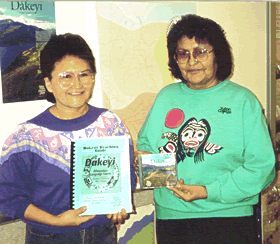 Image of Lorraine Allen and Margaret Workman holding Dakeyi materials